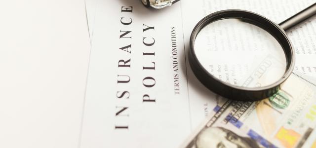 a magnifying glass sitting on top of a piece of paper by Vlad Deep courtesy of Unsplash.